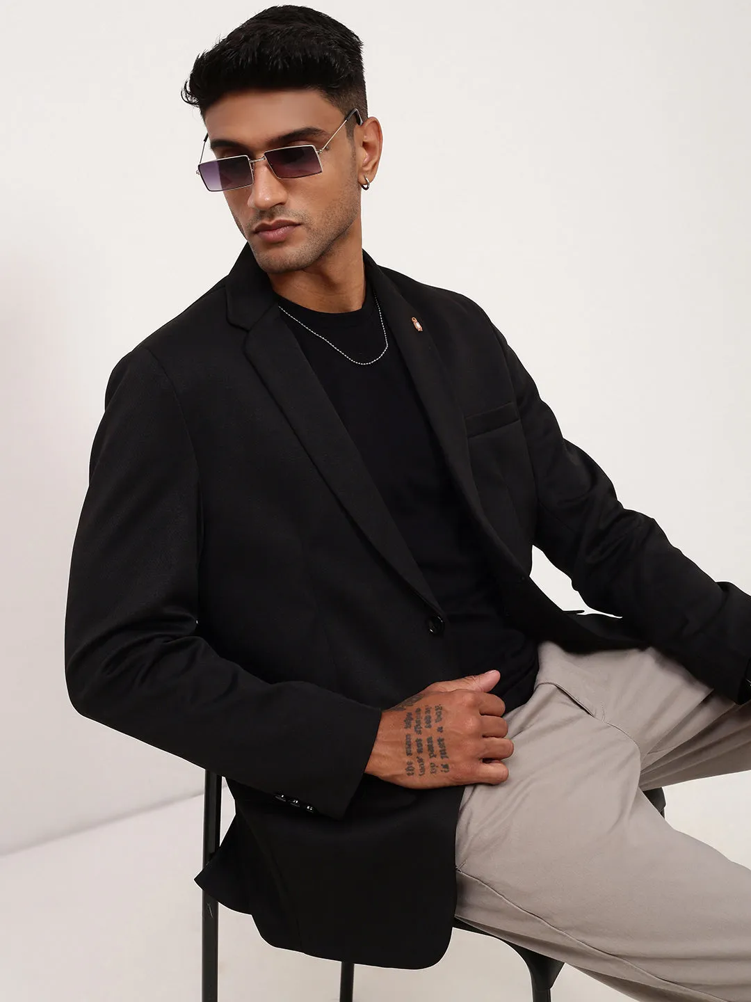Men Black Solid Self Design Single Breasted Blazer
